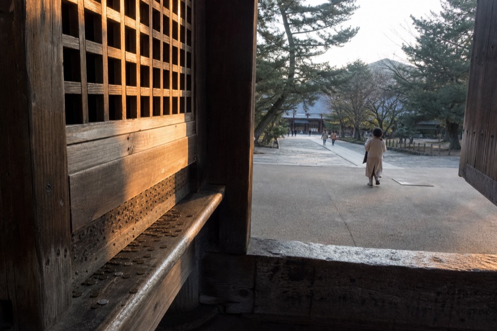 Wooden ticket window at a temple entrance